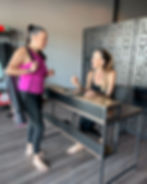 Yoga student being checked in at Yoga Loft Tucson