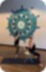 Two people practicing Chair yoga at Yoga Loft Tucson